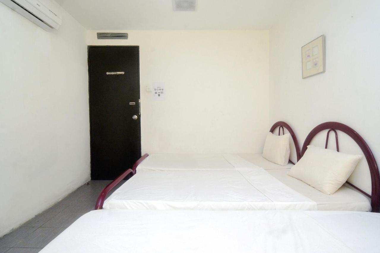 Spot On 89886 Backpacker'S Stay Services Kuching Esterno foto