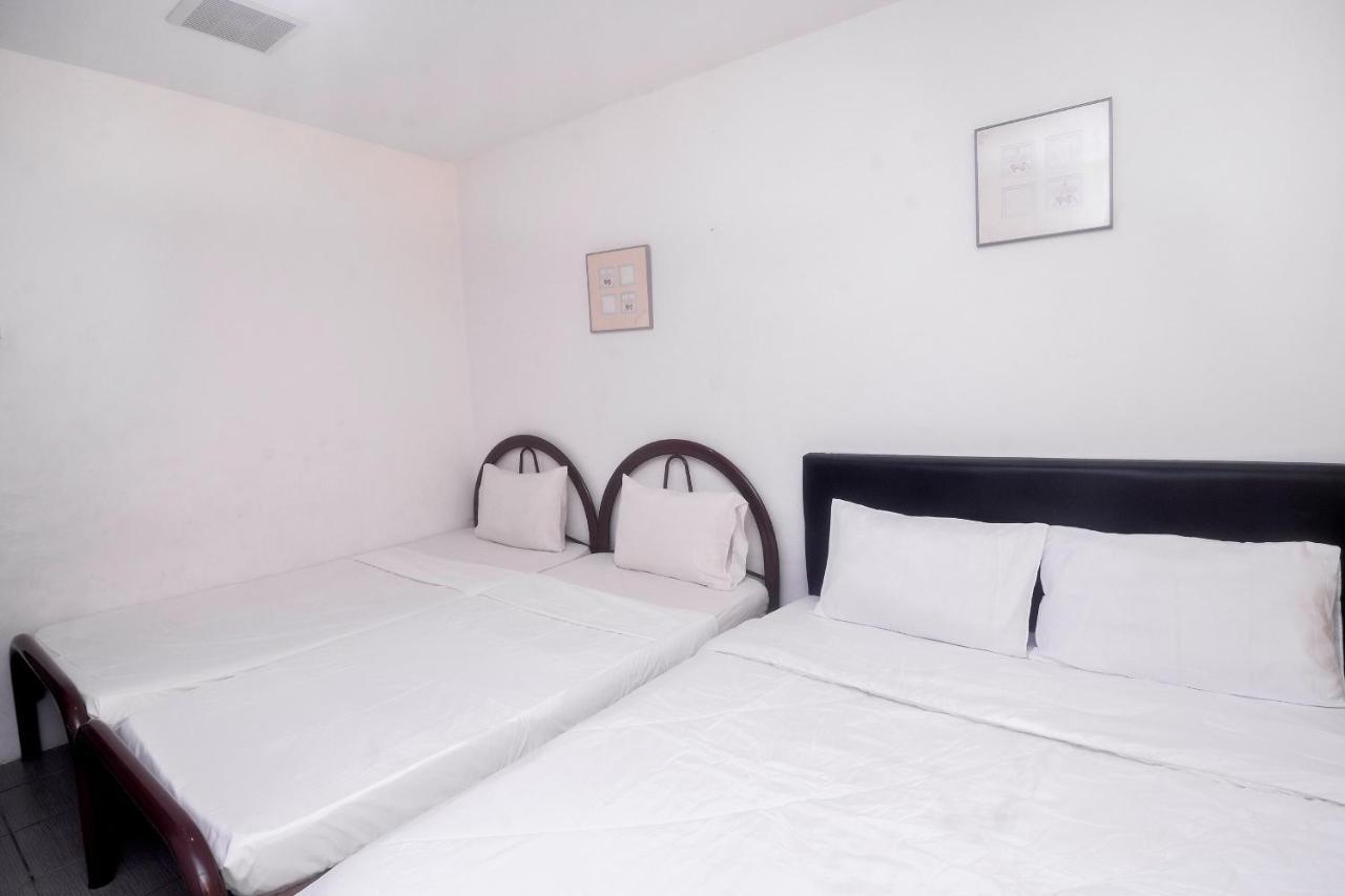Spot On 89886 Backpacker'S Stay Services Kuching Esterno foto