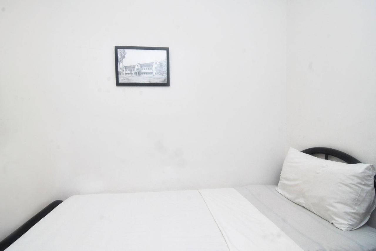 Spot On 89886 Backpacker'S Stay Services Kuching Esterno foto