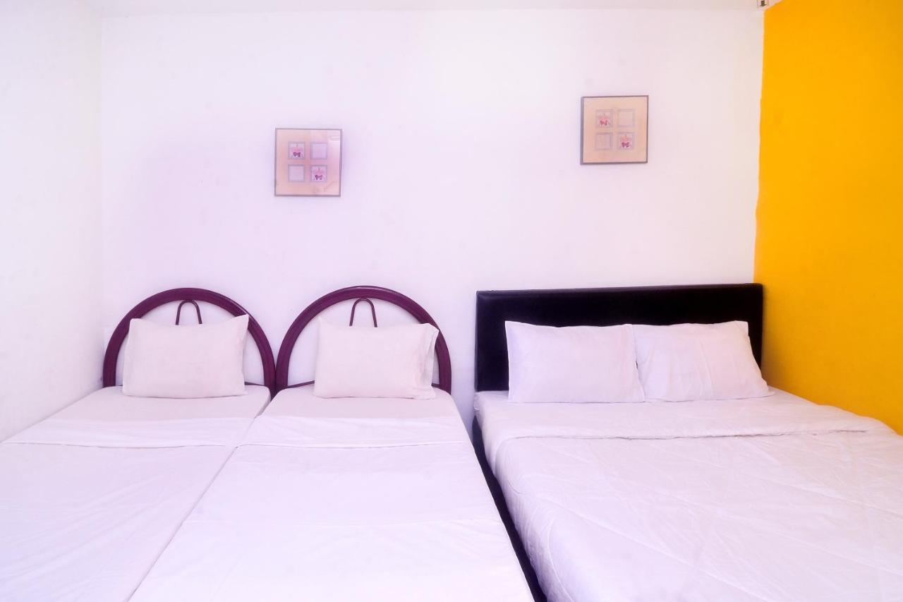 Spot On 89886 Backpacker'S Stay Services Kuching Esterno foto