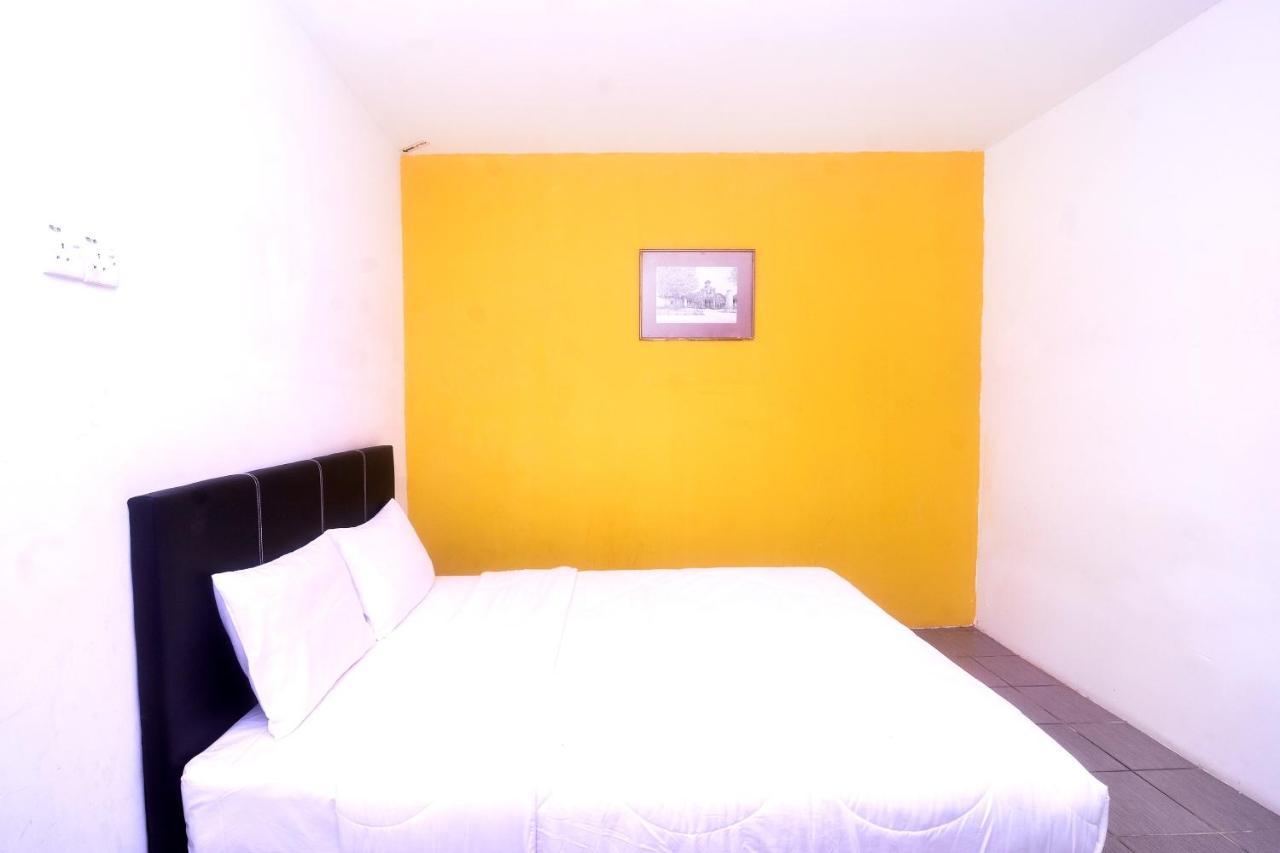 Spot On 89886 Backpacker'S Stay Services Kuching Esterno foto
