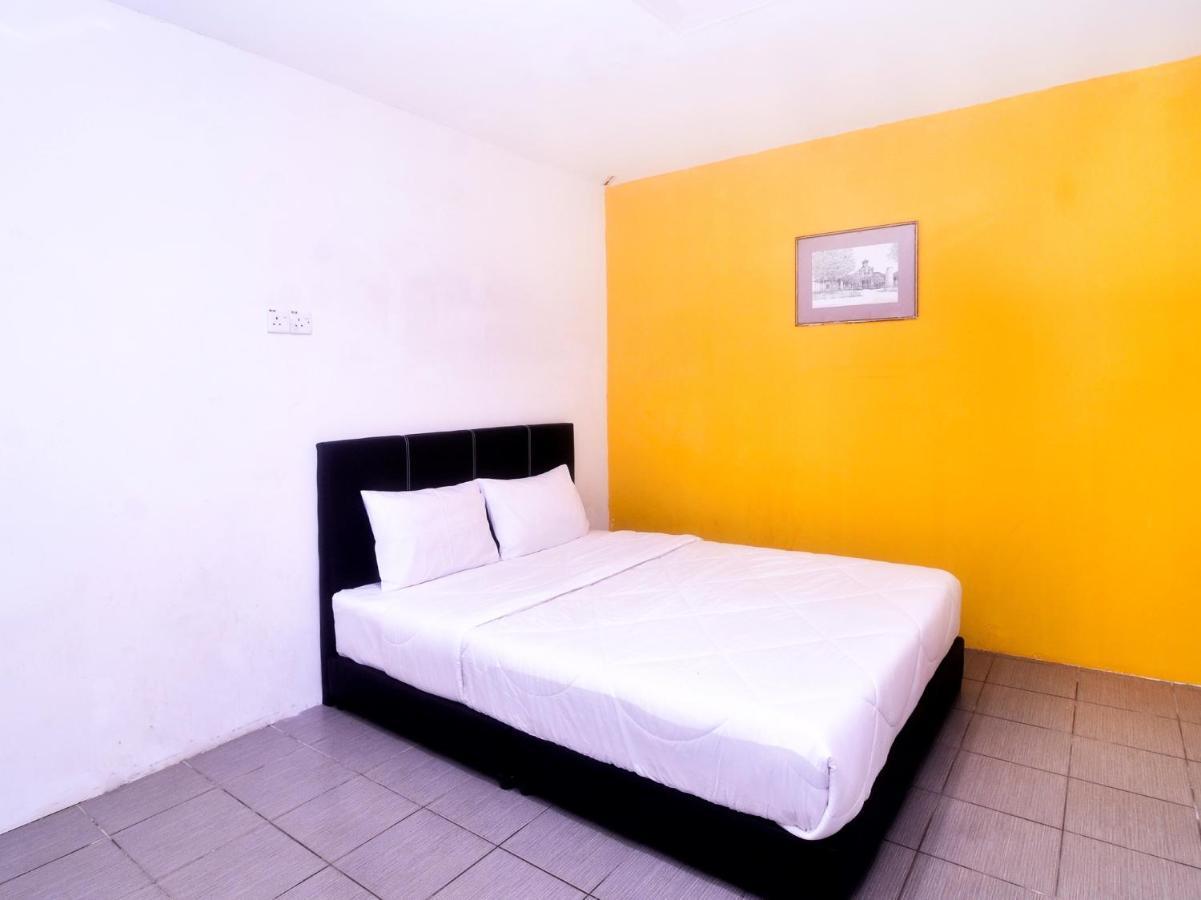 Spot On 89886 Backpacker'S Stay Services Kuching Esterno foto