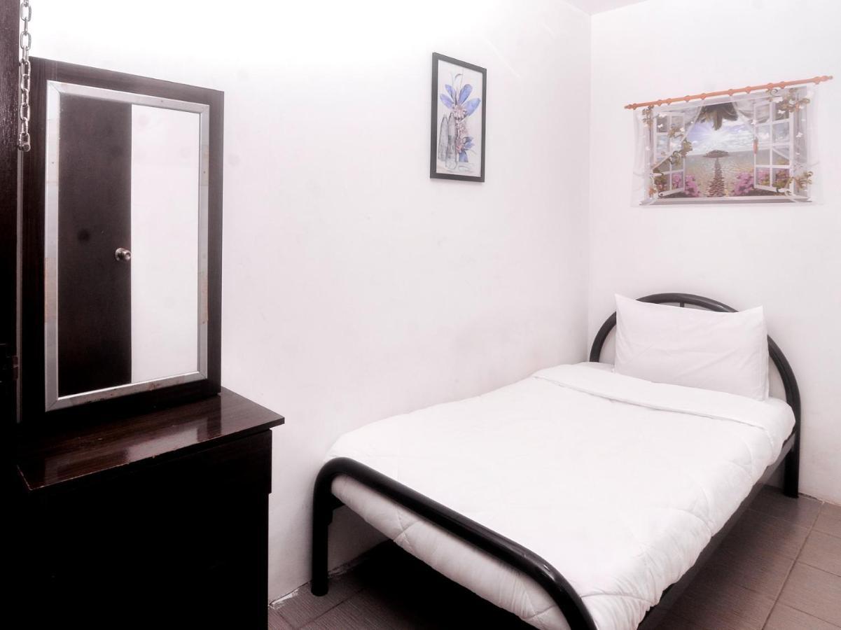 Spot On 89886 Backpacker'S Stay Services Kuching Esterno foto